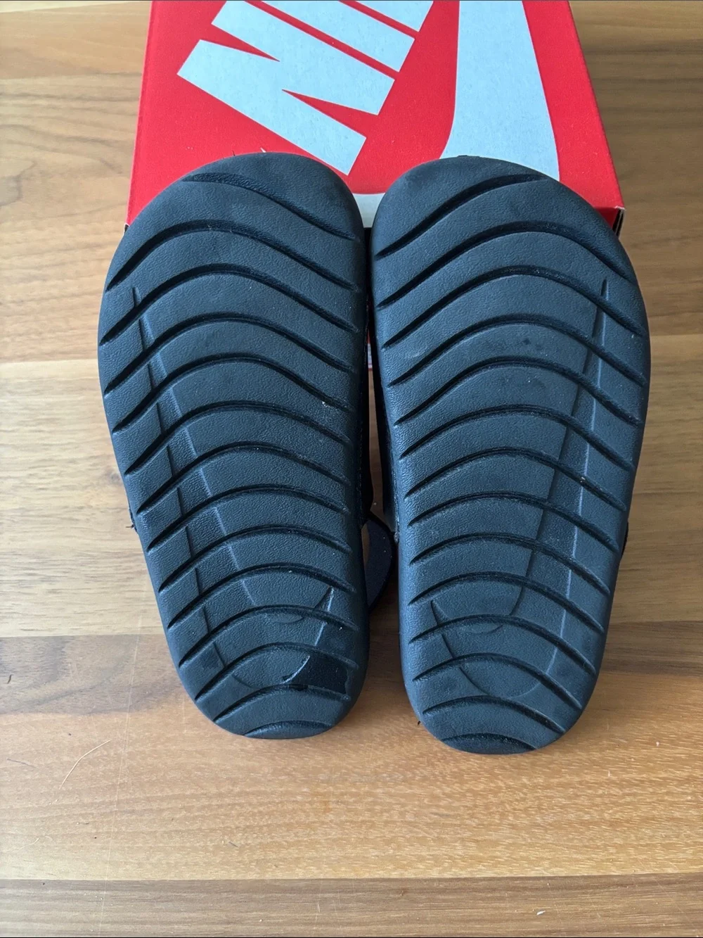 Nike Kids Black Slide Sandals with White Swoosh and Heel Strap